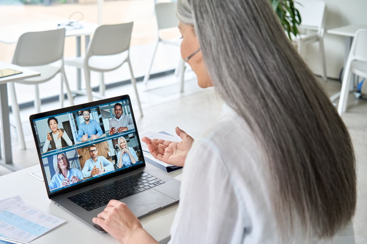 Professional attending online webinar